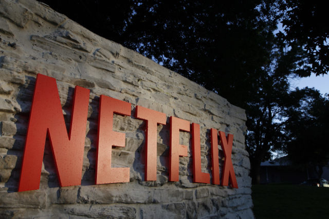 Read more about the article Netflix shares slip as spending weighs on profits