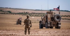 Read more about the article As hundreds of US troops stay in Syria, Trump insists no U-turn