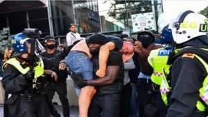 Read more about the article Disorder at far-right linked UK protest to counter anti-racism rally