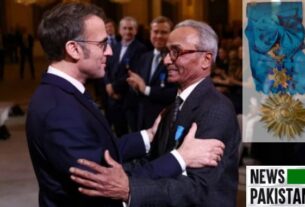 Macron decorates the last newspaper Vendor