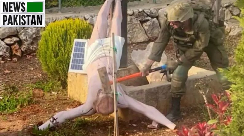 Israeli Soldier Desecrates Crucifix