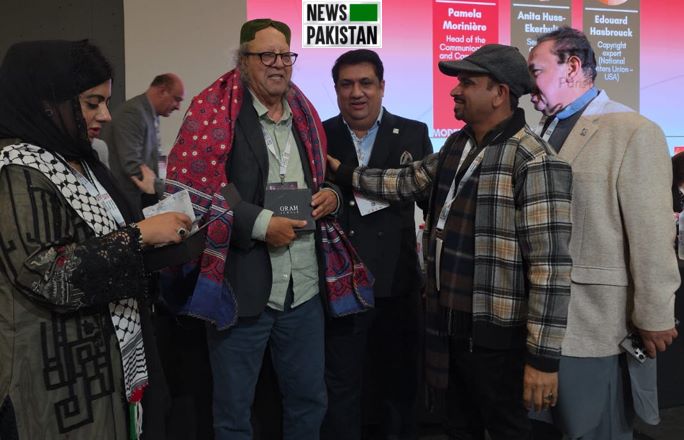 Presenting Ajrak to IFJ Office bearers